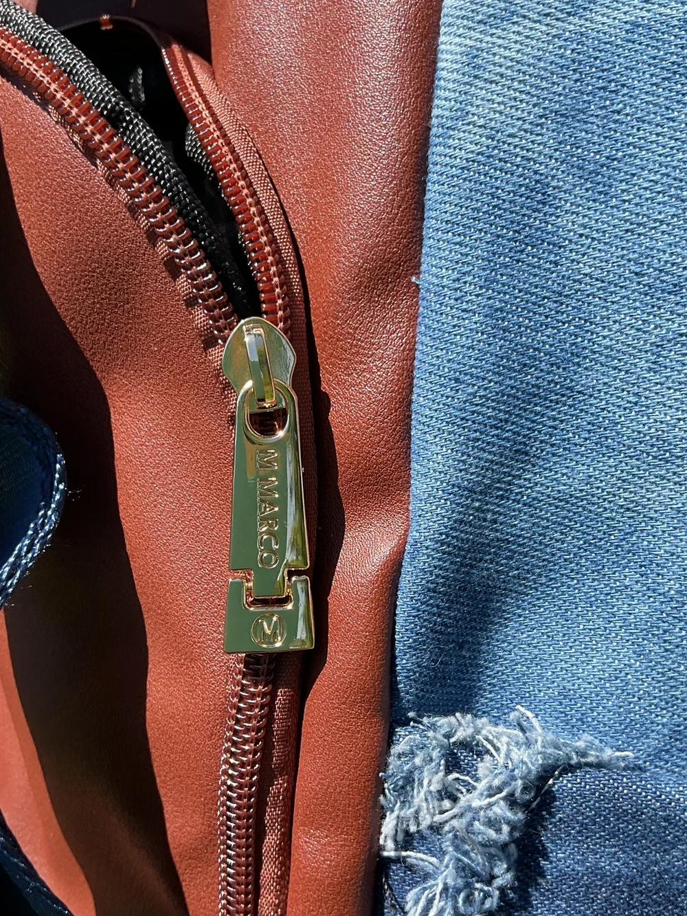 Denim Fringe Quilted Backpack with Brown Trim